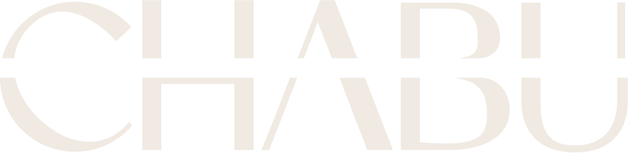 Logo with stylized text 'CHABU' in a light color on a white background